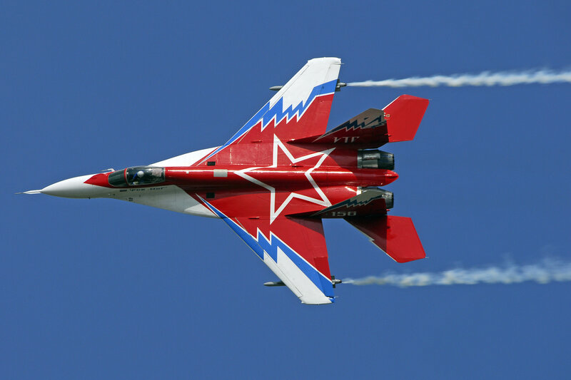 Red and White Jet Fighter — Dynamic, Afternoon, Photograph