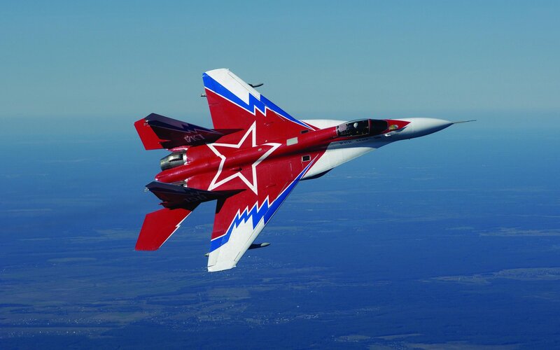 Red and White Jet Fighter — Dynamic, Afternoon