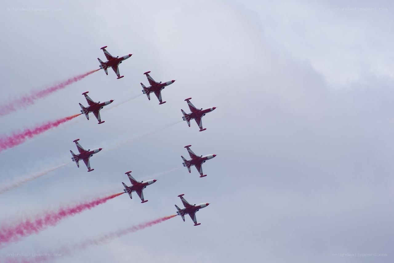 Red and white jets in formation