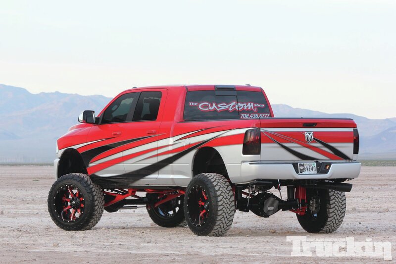 Red and White Lifted Truck — Dramatic