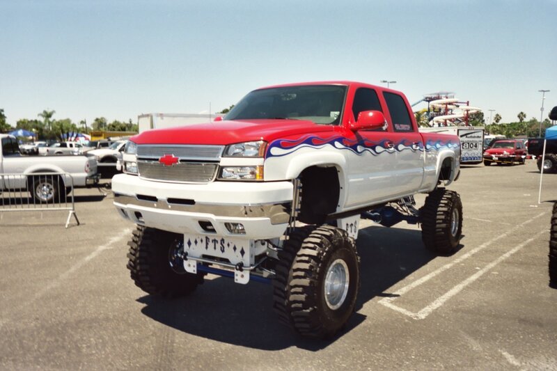 Red and White Lifted Truck