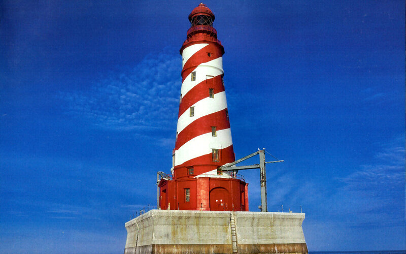 Red and White Lighthouse — Blue, Dramatic, Afternoon, Photograph