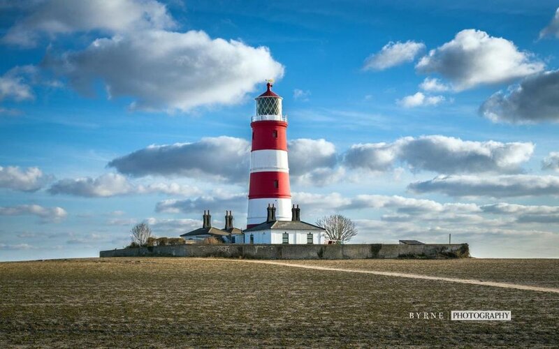 Red and White Lighthouse — Blue, Serene, Afternoon, Photograph, Buildings