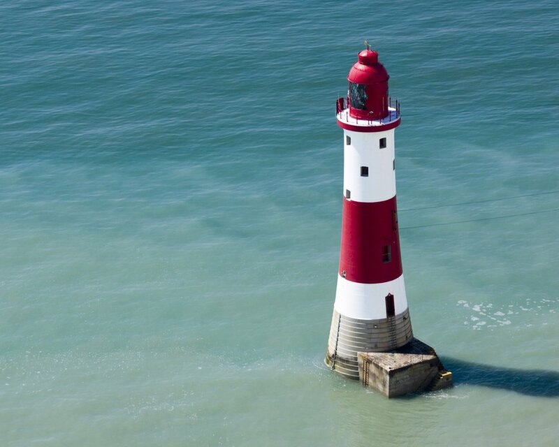 Red and White Lighthouse — Blue, Serene, Afternoon, Photograph