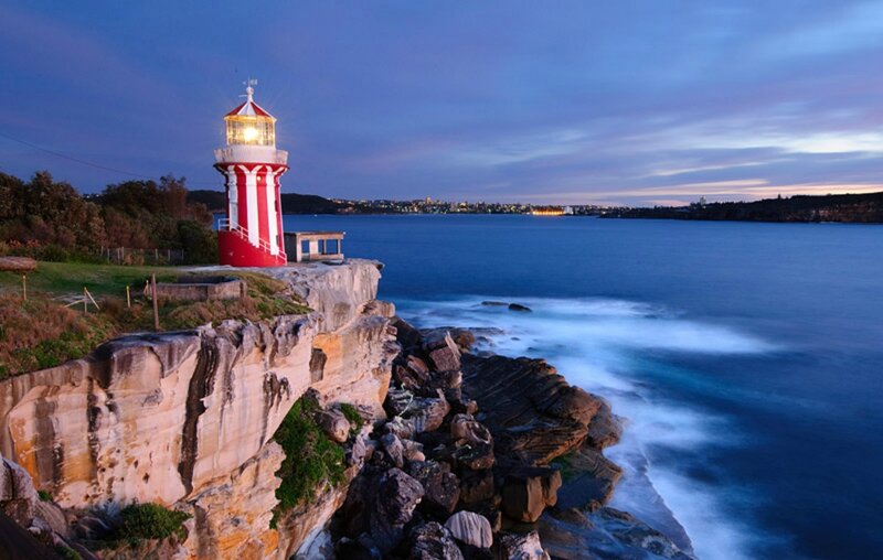 Red and White Lighthouse — Blue, Serene, Sunset