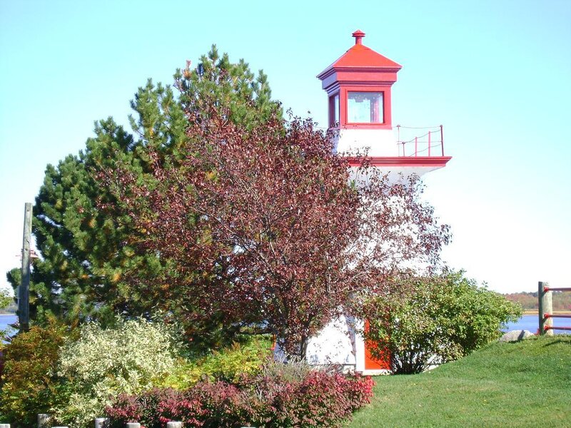 Red and White Lighthouse — Serene, Autumn