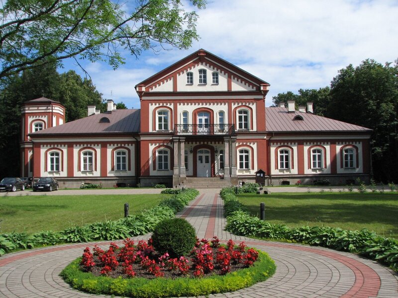 Red and white manor house