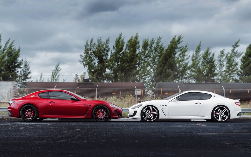 Red and white Maserati cars