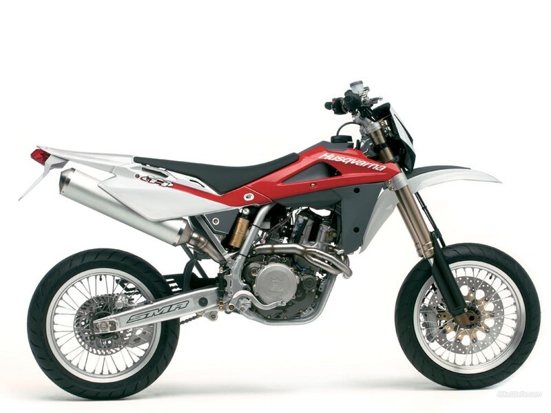 Red and White Motorcycle — Neutral, Photograph, Exhaust Pipe, Front Wheel, Seat