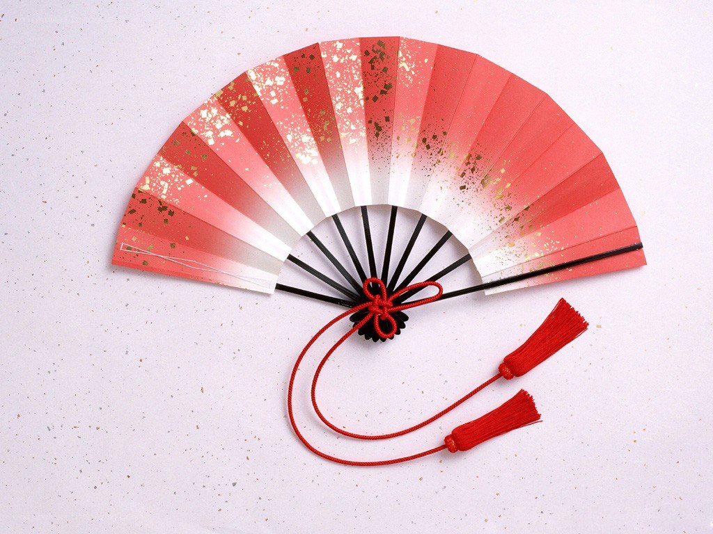 red and white paper fan