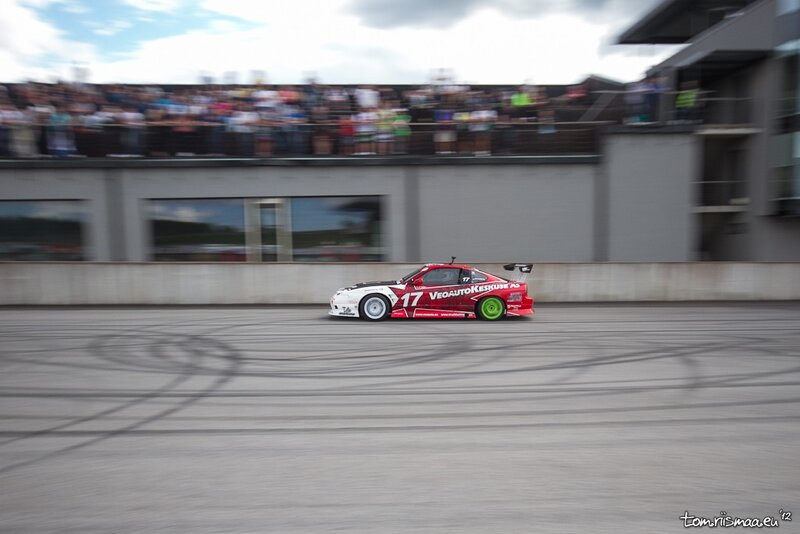 Red and White Race Car — Dynamic, Afternoon, Photograph, Crowd