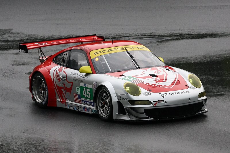 Red and White Race Car — Dynamic, Photograph, Race Car, Wet Track
