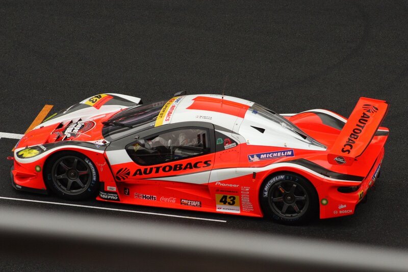 Red and White Race Car — Dynamic, Photograph, Race Track, Tire