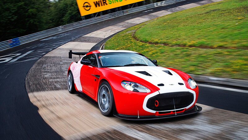 red and white race car on track