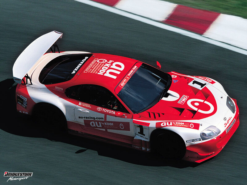 red and white race car on track