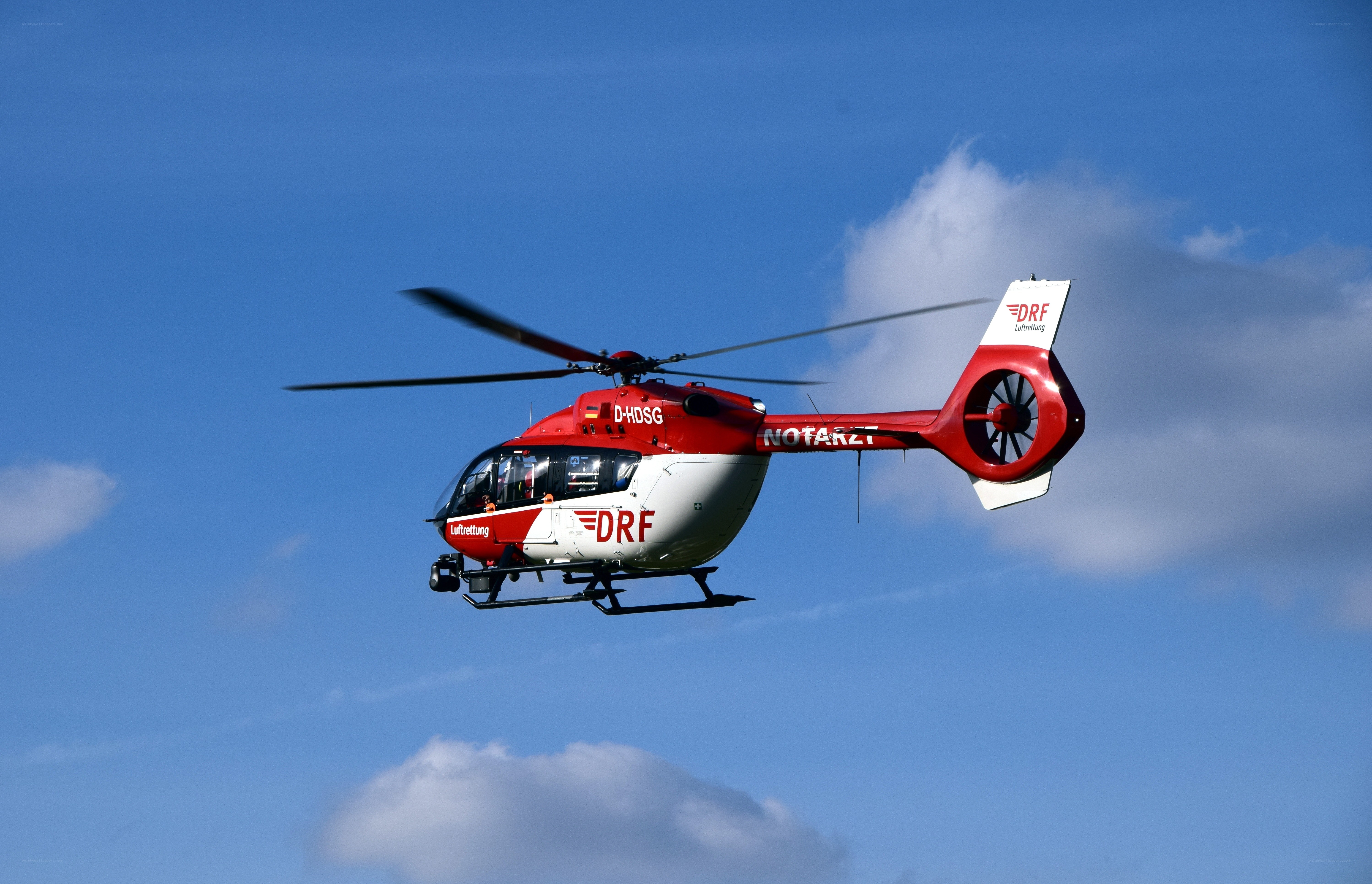 Red and white rescue helicopter