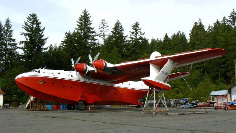 Red and white seaplane on display