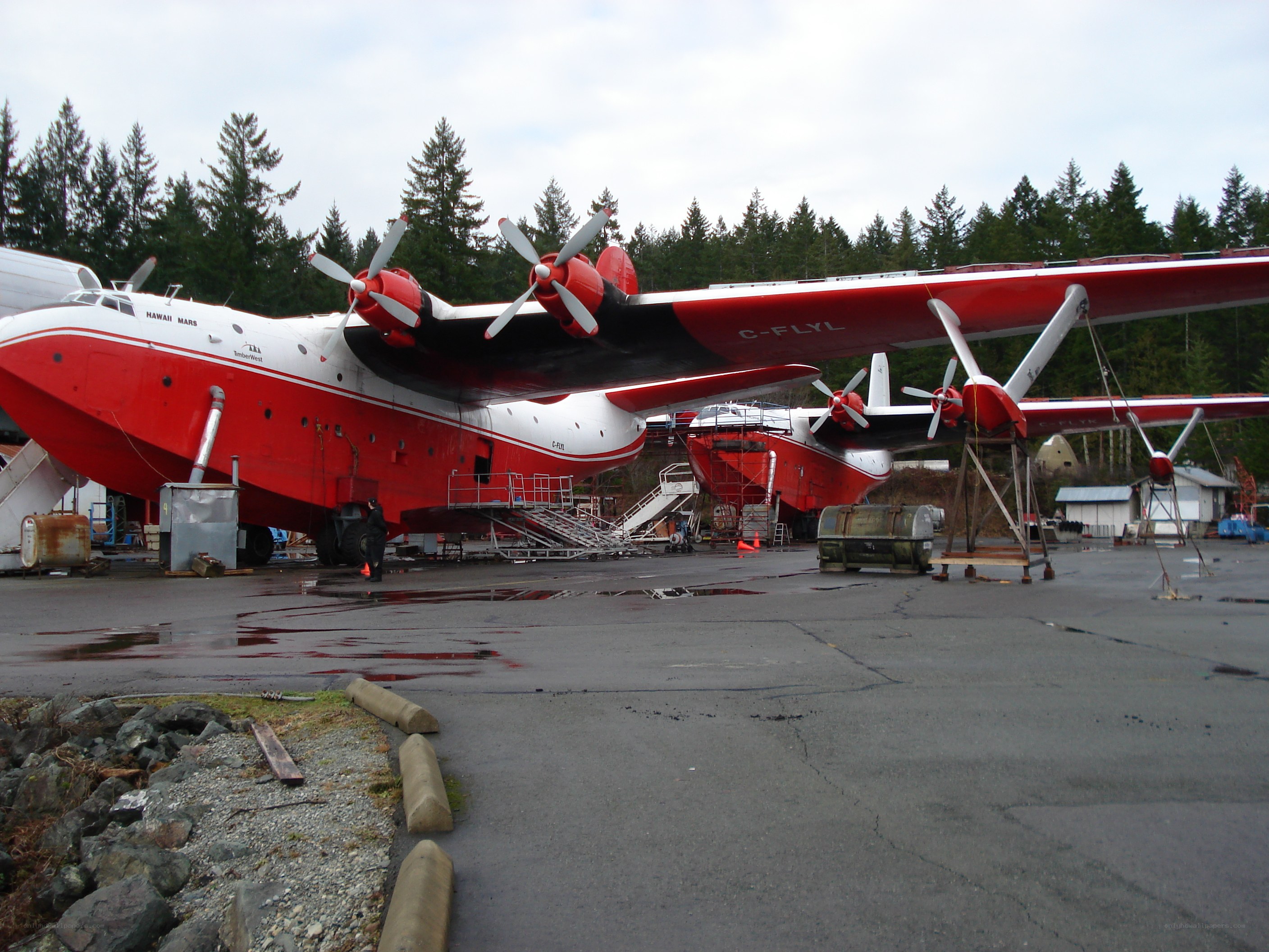 Red and white seaplane on display