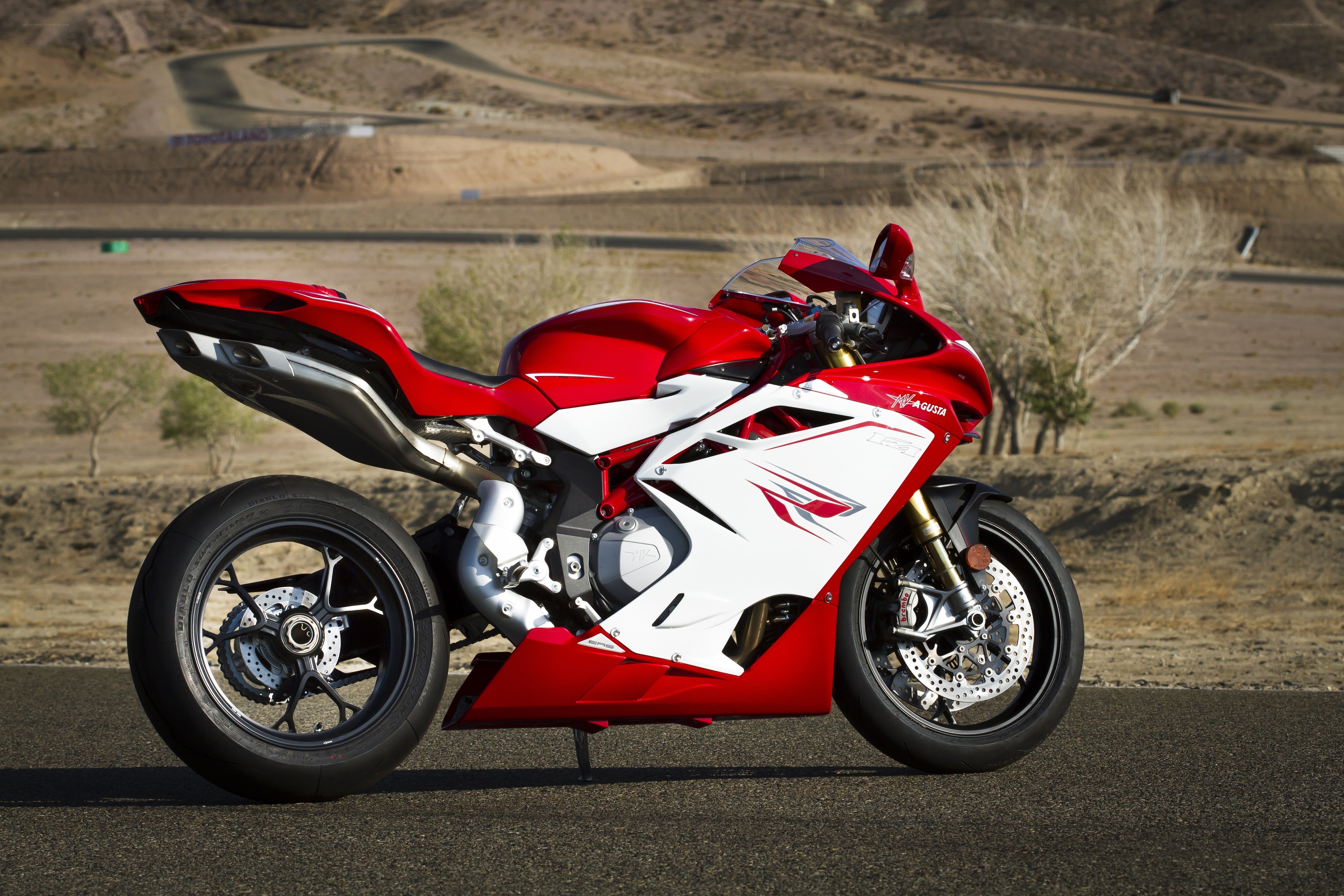 red and white sport motorcycle
