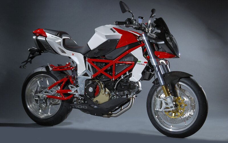 red and white sport motorcycle