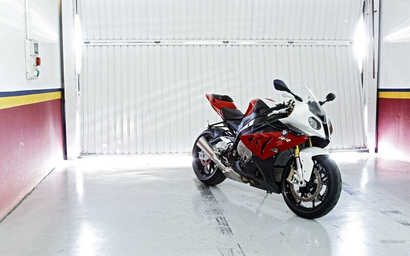red and white sport motorcycle