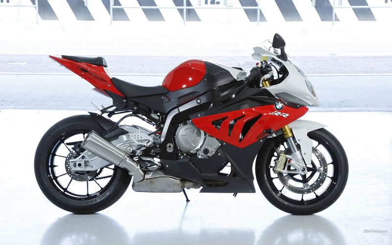 red and white sport motorcycle