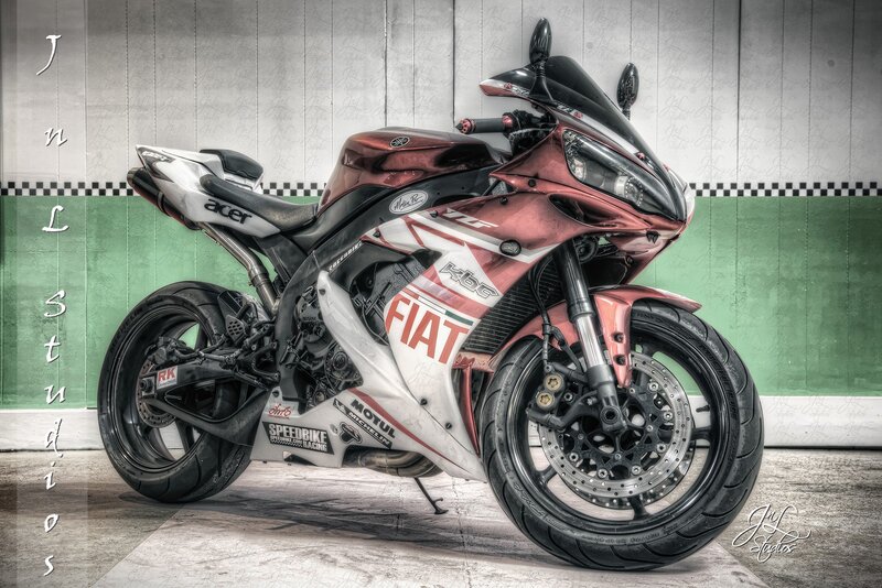 red and white sport motorcycle