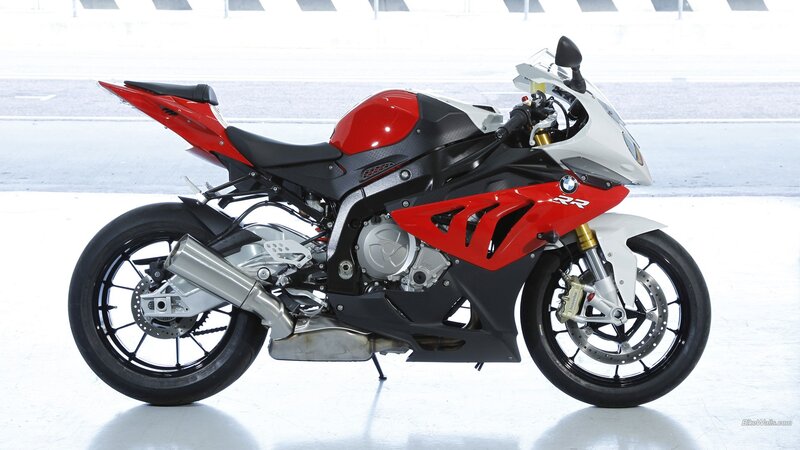 red and white sport motorcycle