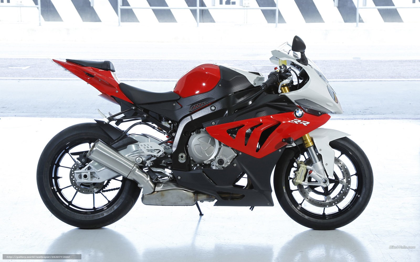 red and white sport motorcycle