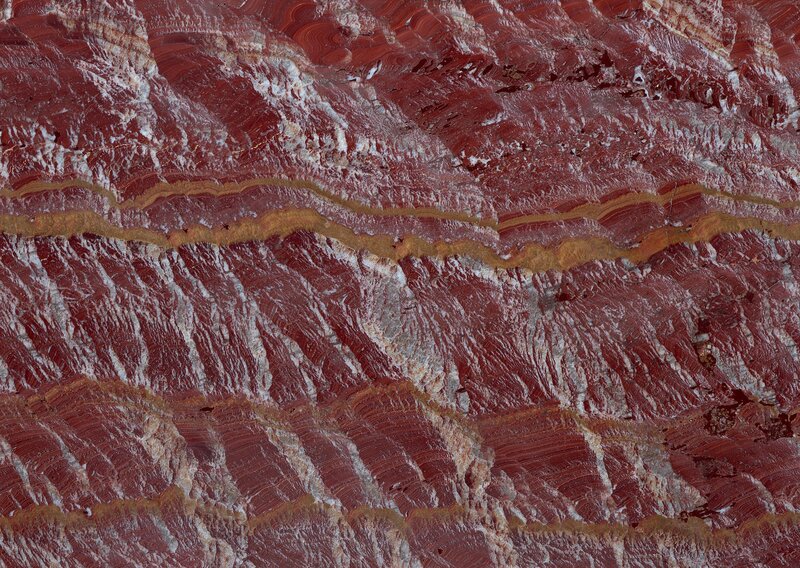 Red and white striped rock formation