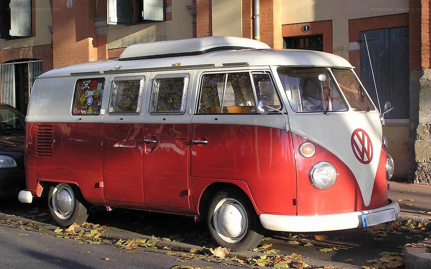 Red and white VW camper van