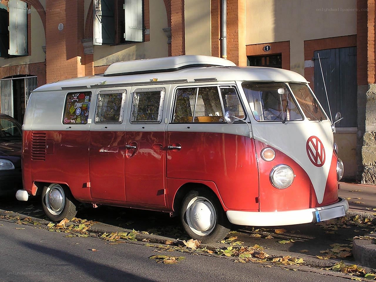Red and white VW camper van