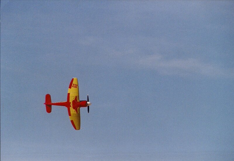 Red and Yellow Airplane — Blue