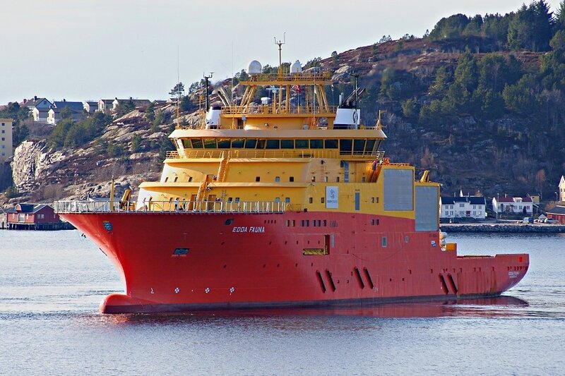 Red and yellow research vessel