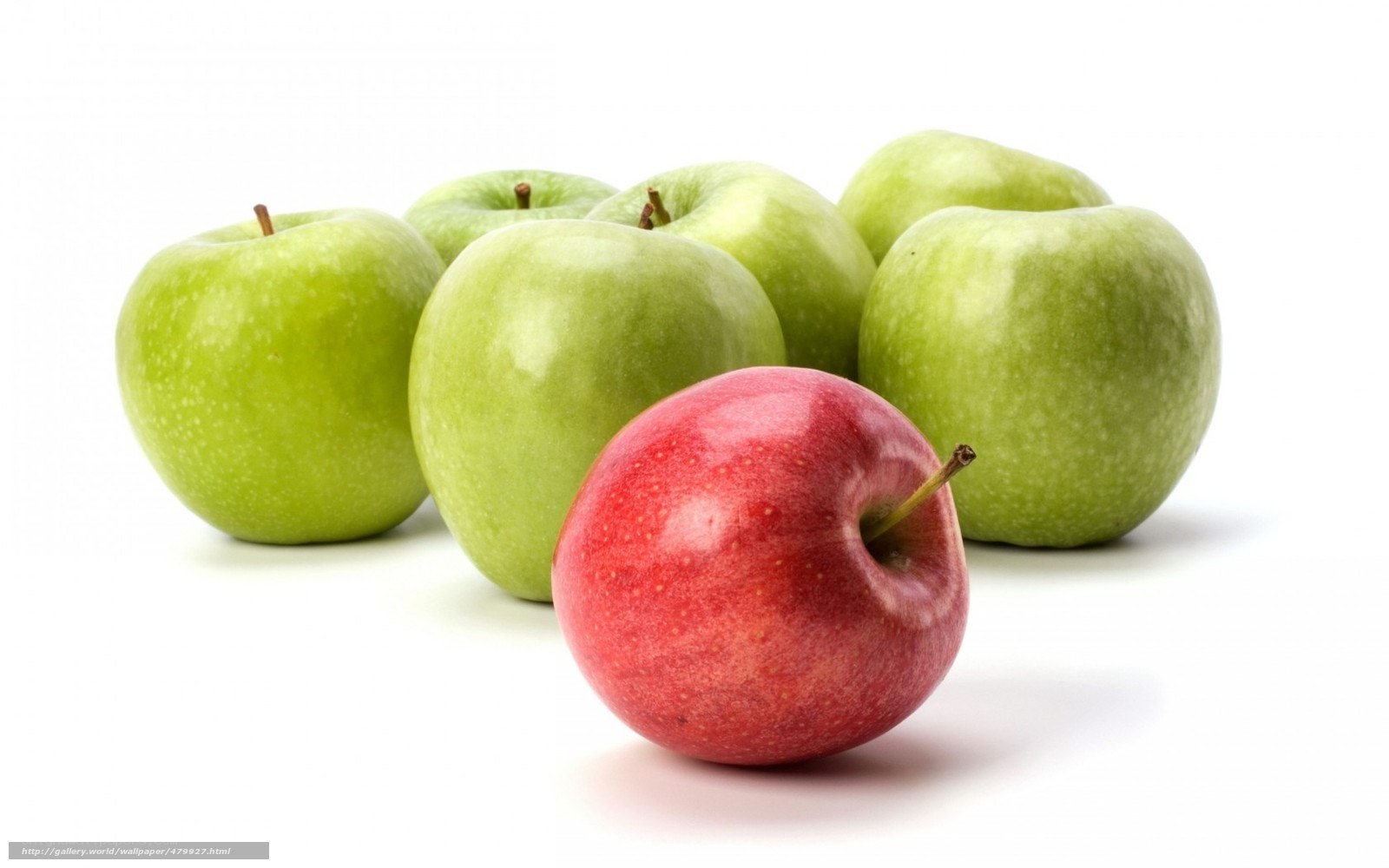 red apple among green apples