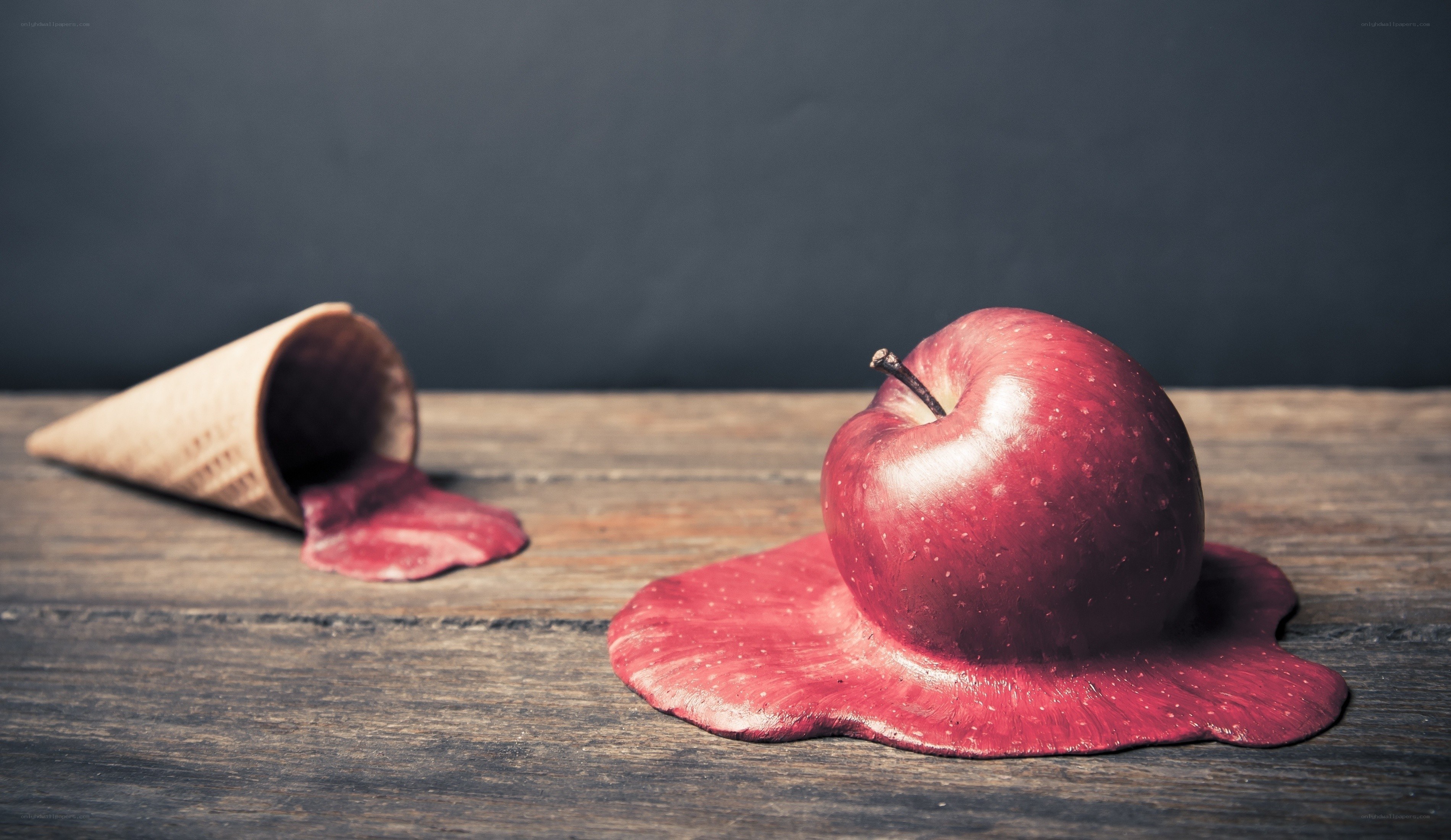 Red apple and melting ice cream