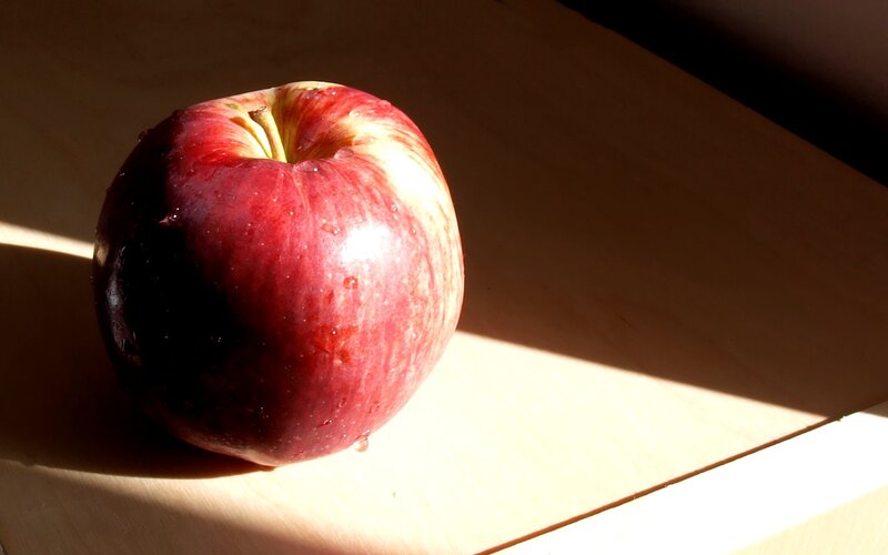 red apple in sunlight