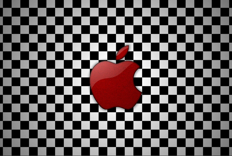 red apple on checkered background
