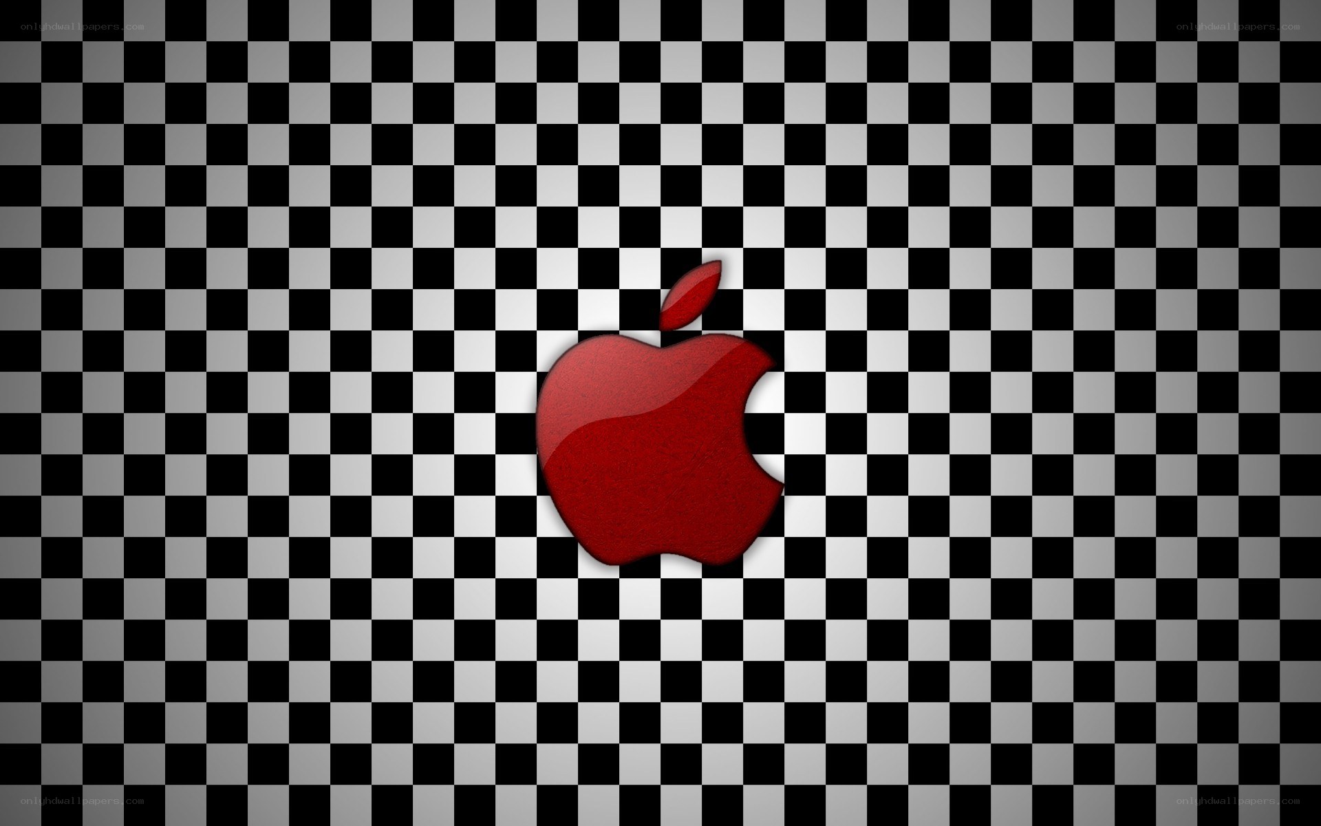 red apple on checkered background