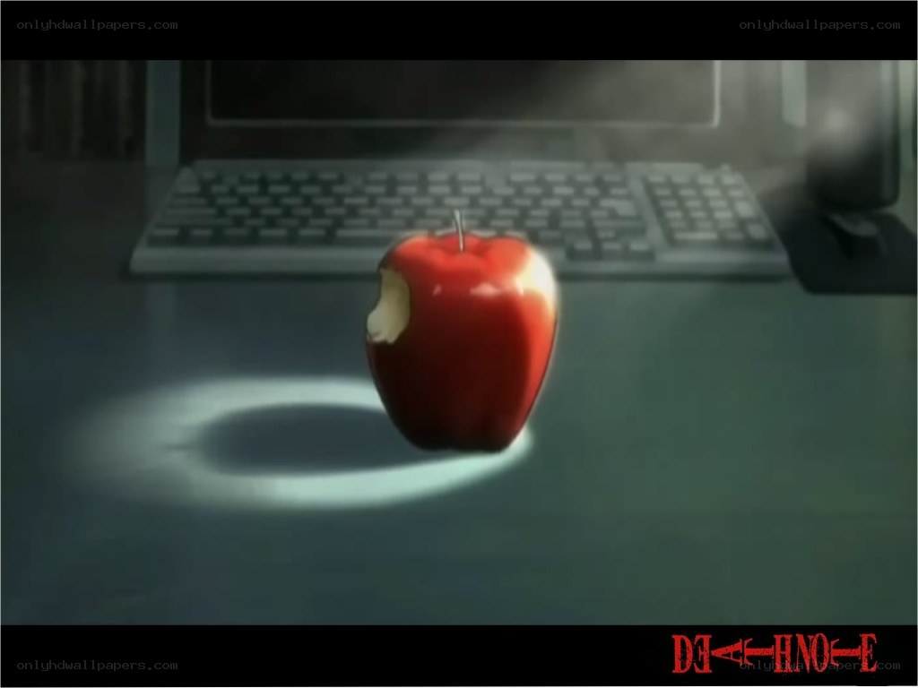 red apple on desk