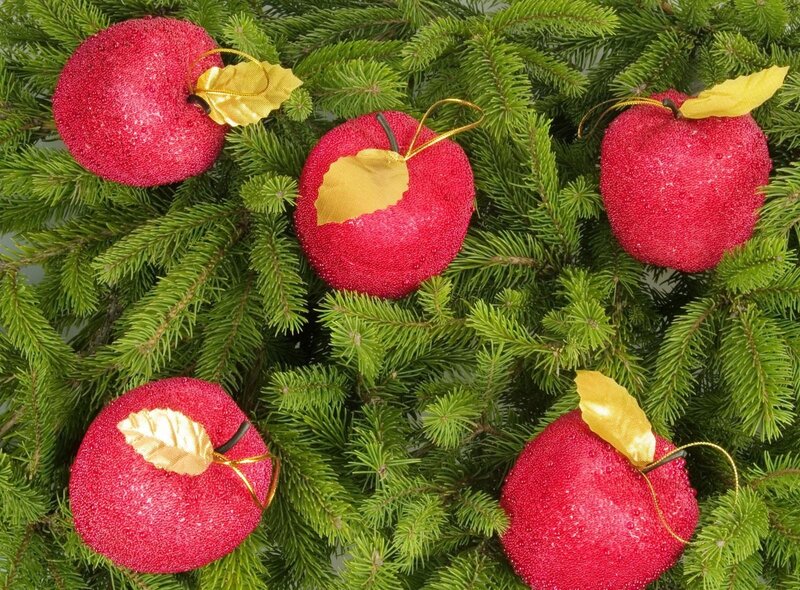 red apple ornaments on pine