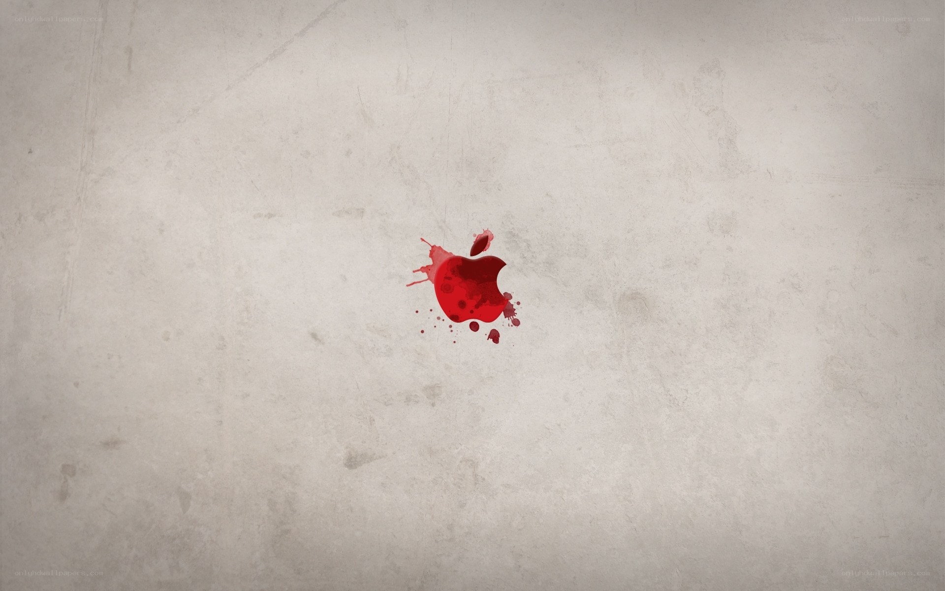 Red apple splatter on concrete