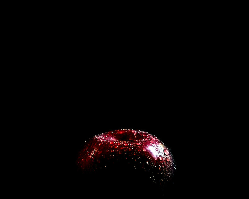 red apple with water droplets