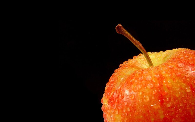 red apple with water droplets