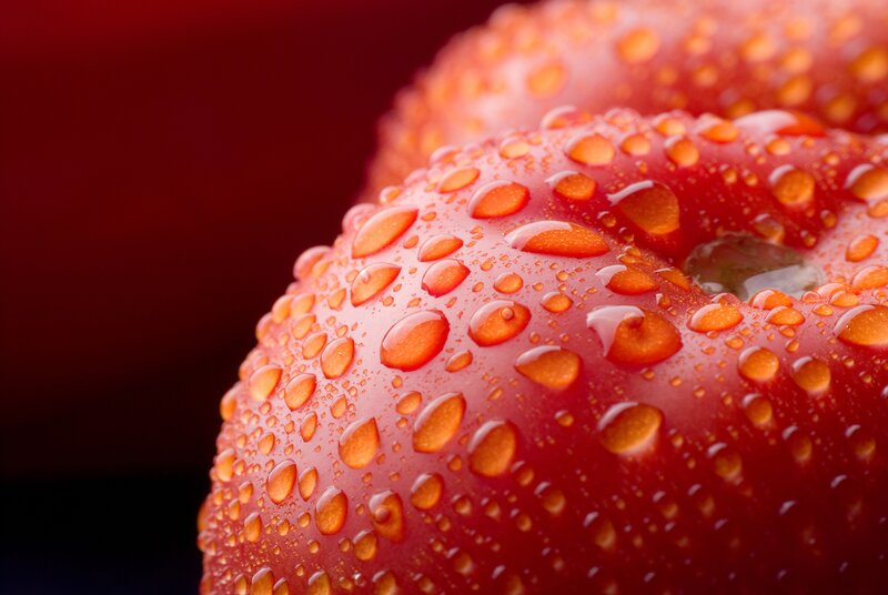 Red apple with water droplets