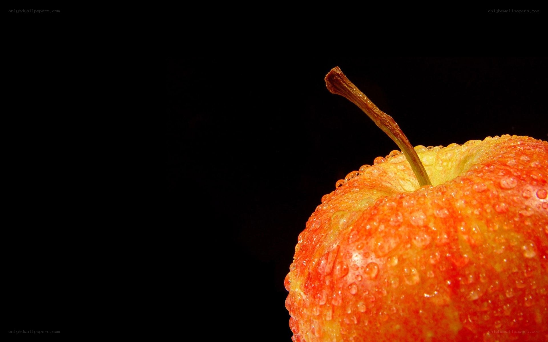 red apple with water droplets