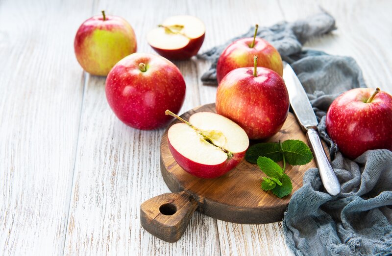 Red Apples on Cutting Board