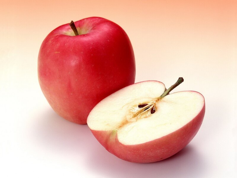 Red apples on white background