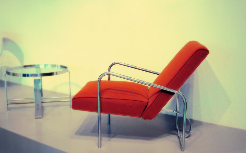 Red armchair with side table