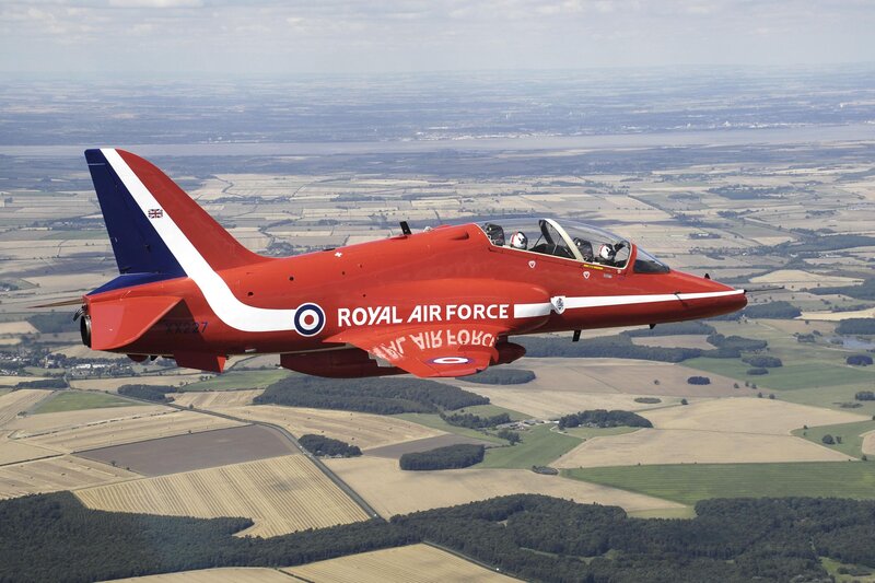 Red Arrows jet in flight